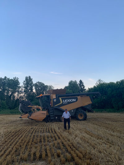 Tractor in field w/ George Mueller